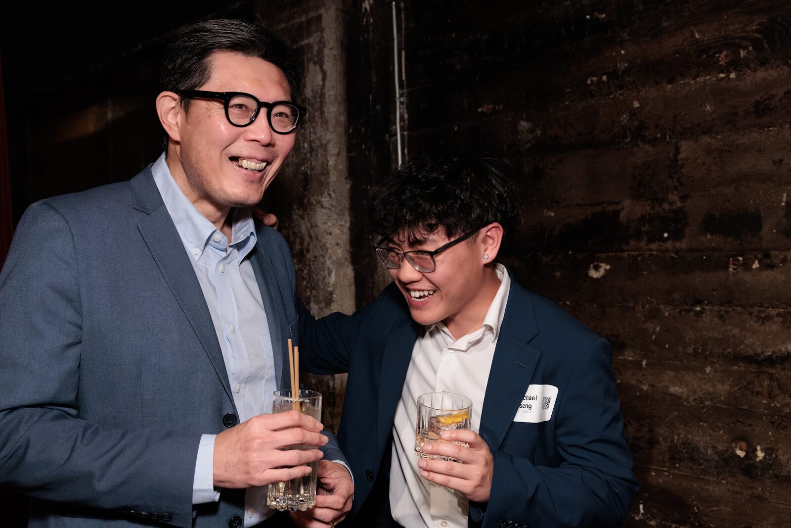Guests sharing a laugh during the reception