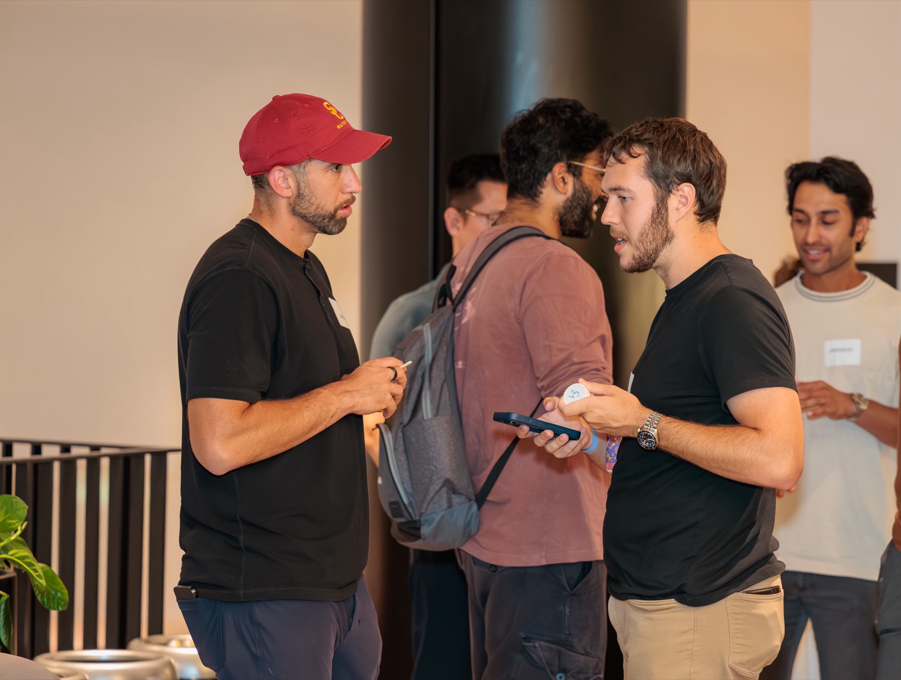 Miles networking with attendees